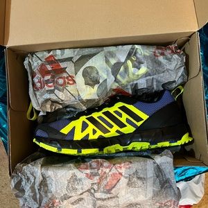 Adidas blue and green running shoes. New and never been worn.